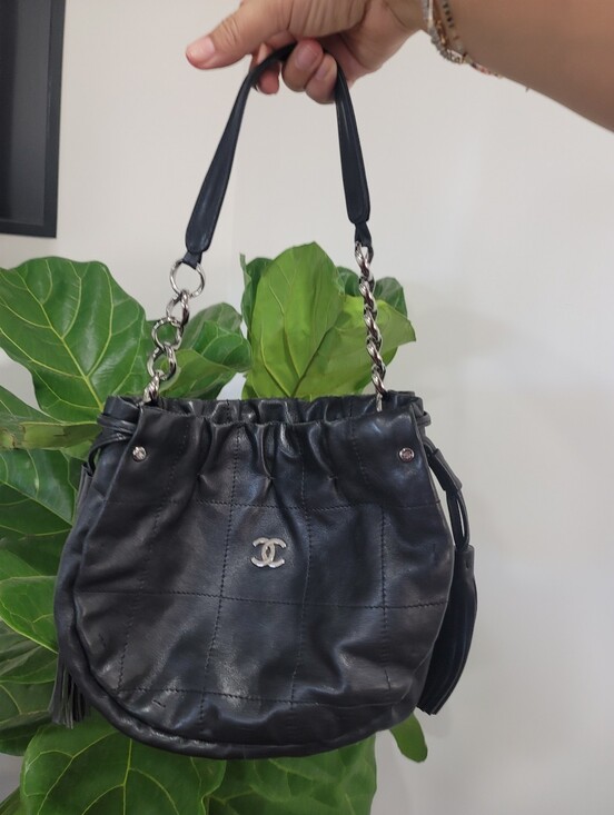 CHANEL Handbags - Chanel Black Quilted Drawstring Bucket Bag